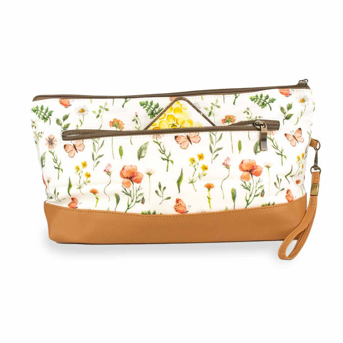 Back view of Mountain Meadow Trinity Bag showing the exterior zipper pocket partially open revealing a honeycomb-print lining inside