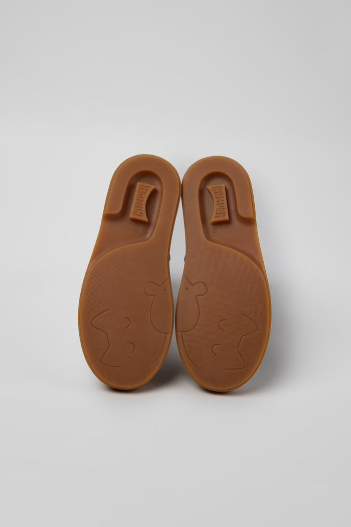 rubber sole of shoes on grey background