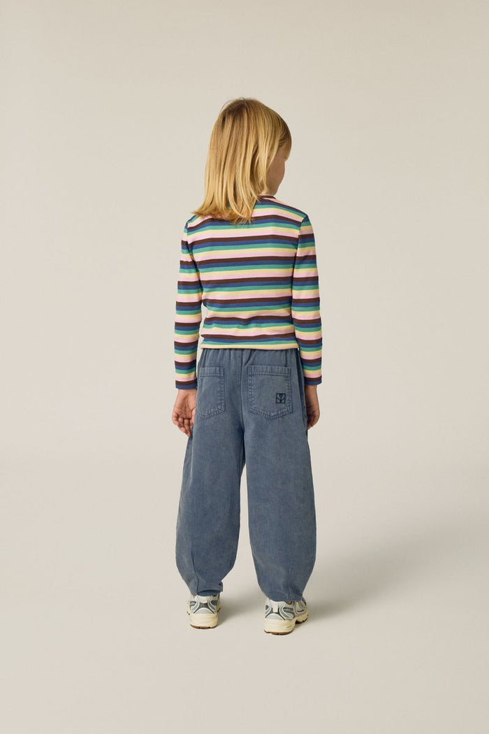 child wearing multicolor stripes shirt