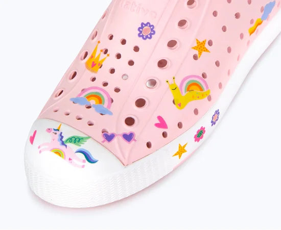 Pink shoe with colorful patterns on a white background