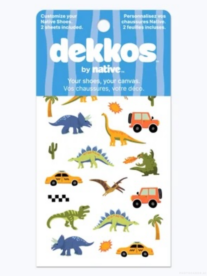 Sheet of stickers with dinosaurs and vehicles by dekkos on a white background