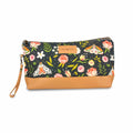 Night Forest Trinity Bag medium zippered knitting project bag with dark navy moth and floral print fabric, tan faux leather bottom, and wrist strap