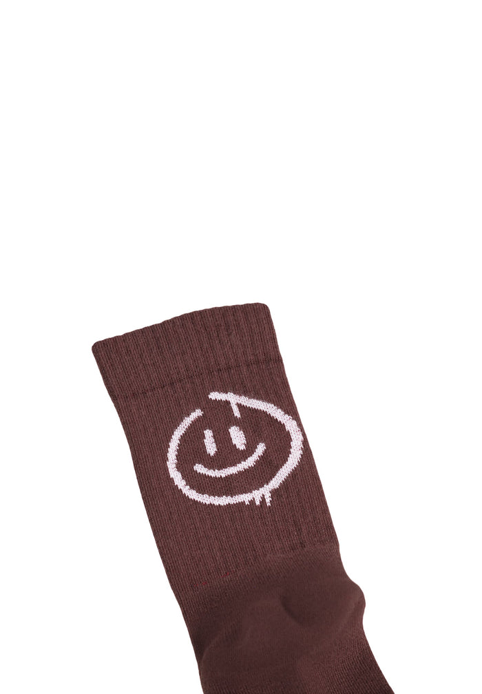sock with a white smiley face design on a white background