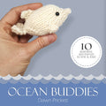 Ocean Buddies ebook cover by Dawn Prickett showing hand holding tiny knitted whale with 10 seamless sea friends to knit