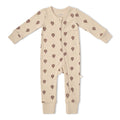 zip down baby one-piece in beige with red stripe hot air balloon print on white background