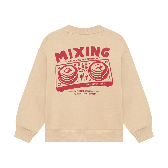 Back view of a beige crewneck sweatshirt with red DJ mixing table and pancakes as the records graphic white background