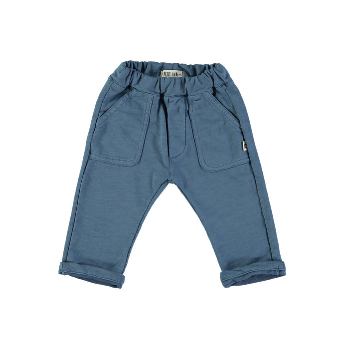 Blue baby pants with a brand label on a white background