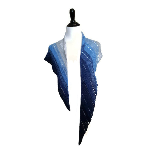 Pathway scarf in gradient blue and white draped over mannequin shoulders showing the full length with pointed ends hanging down