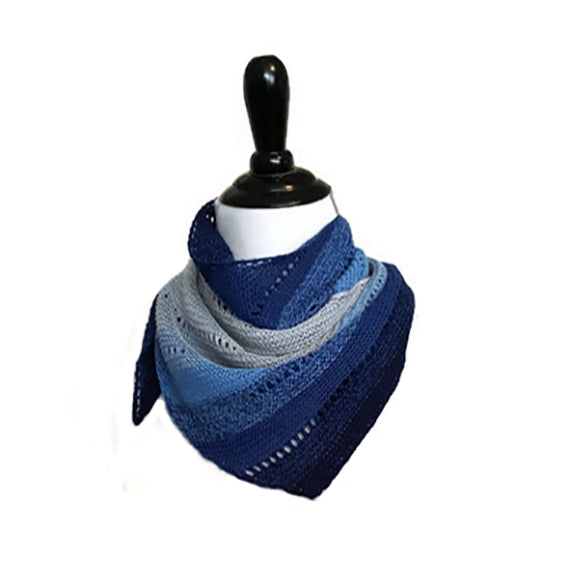 Pathway scarf wrapped snugly around mannequin neck in cowl style, showing the gradient diagonal stripes from dark navy on the outside to light blue and white at the center