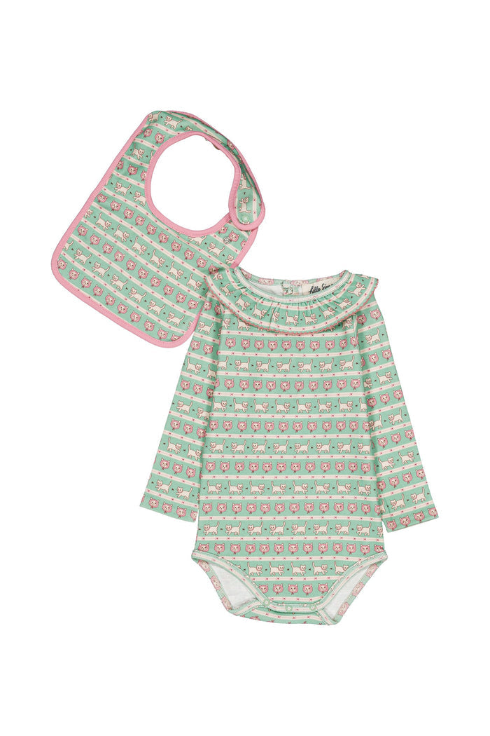 A baby clothing set featuring a long-sleeve bodysuit and a bib, both in a mint green and pink patterned fabric with a white ruffled collar on the bodysuit.