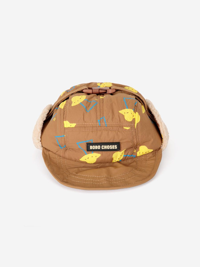 brown winter cap for kid. All over pixel abduction print.