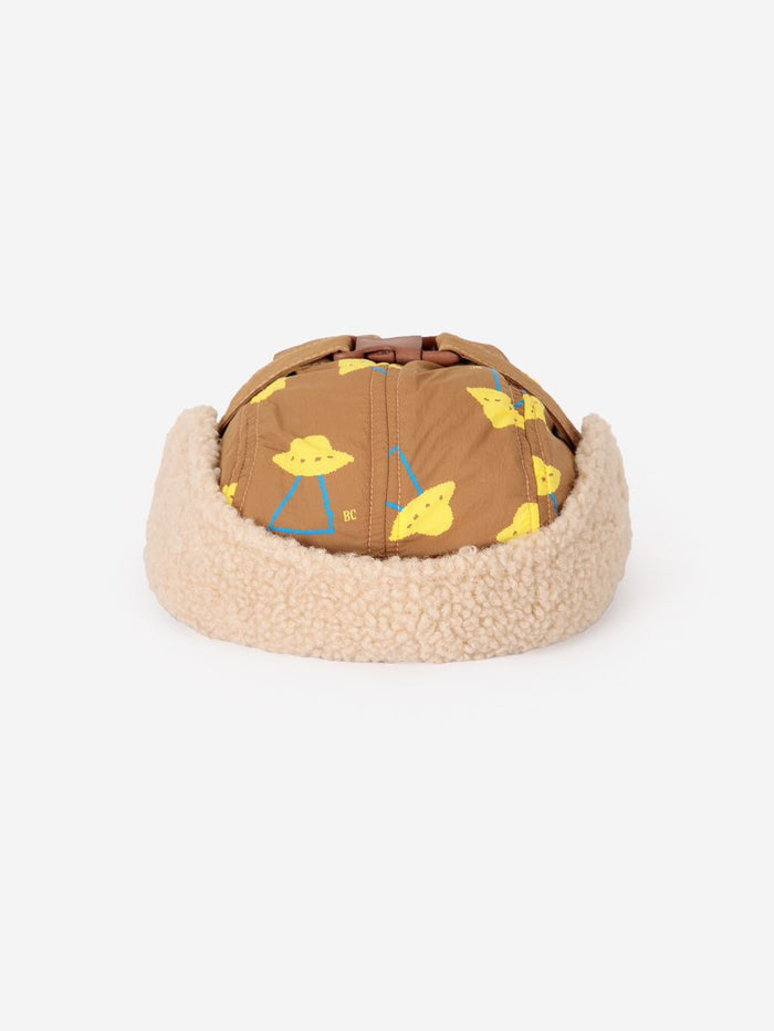 brown winter cap for kid. All over pixel abduction print.