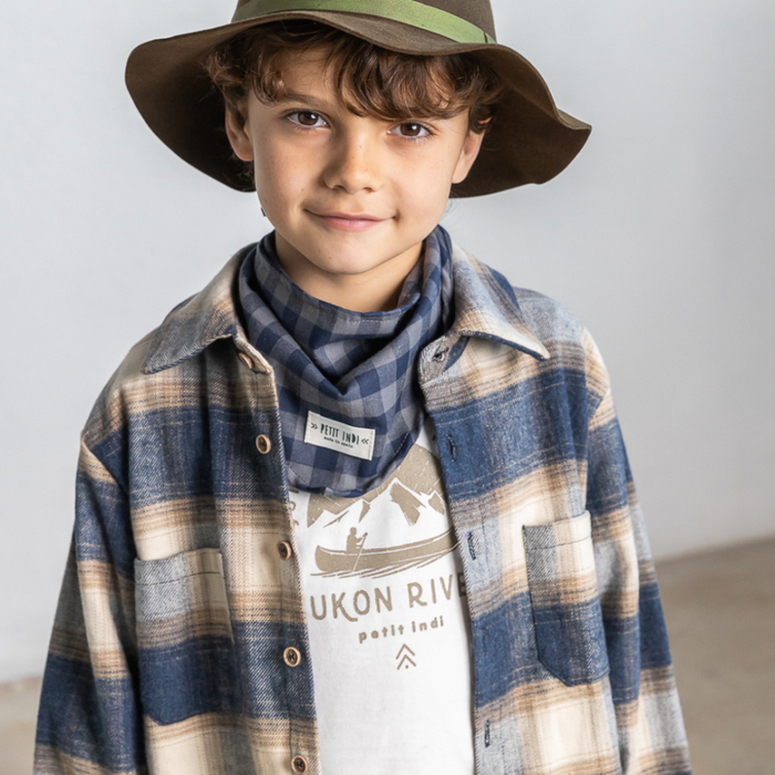 Child wearing plaid overshirt