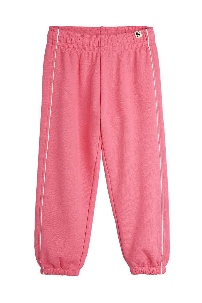 Pink sweatpants with white stripes on a white background