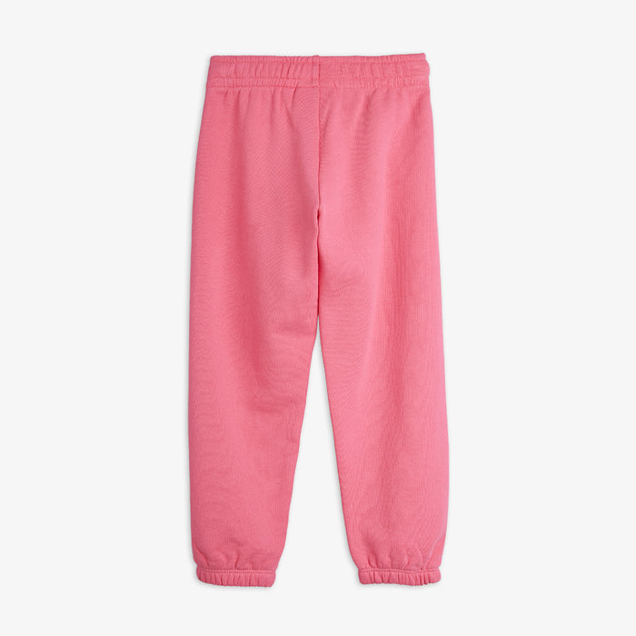 Pink sweatpants on a white background