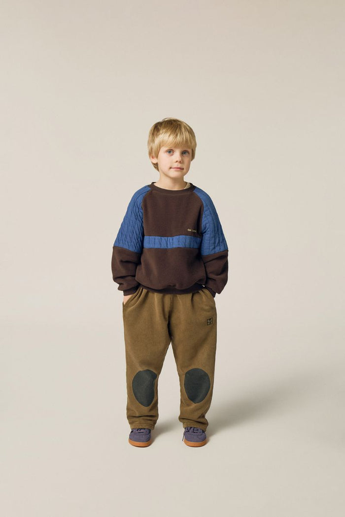 Child wearing polar sweatshirt