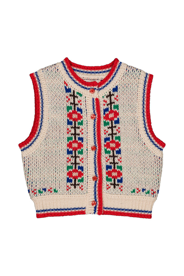 A cream-colored knit cardigan vest with red, blue, and green geometric patterns on the front and red trim, shown against a plain white background.