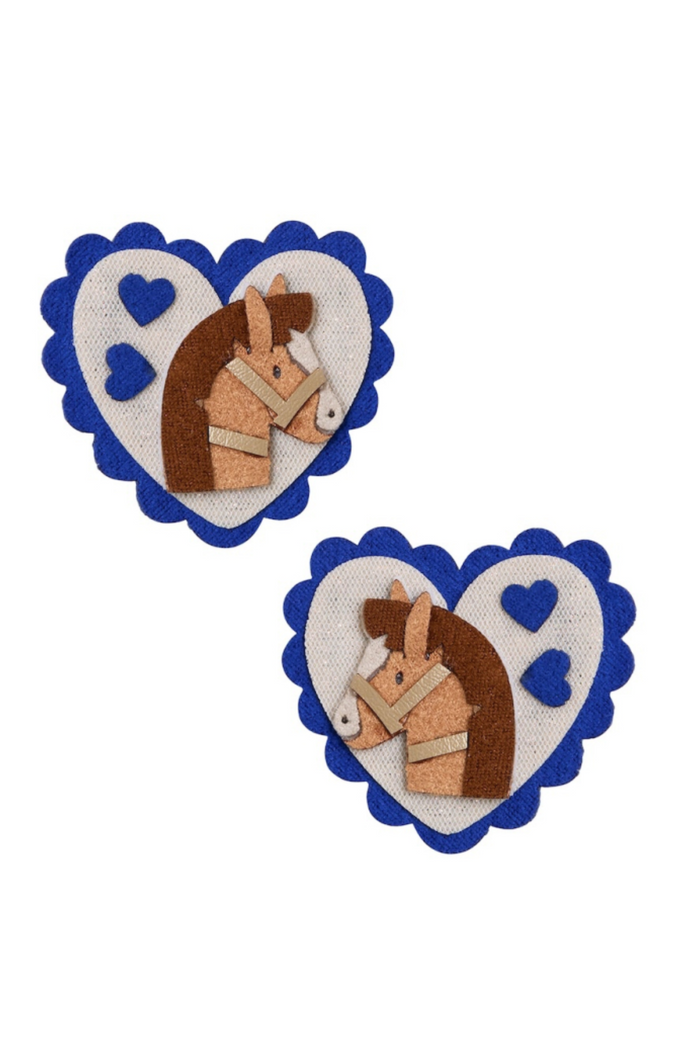 Two matching heart-shaped hair clips featuring a brown horse illustration on a white background with a blue scalloped border and small blue hearts, shown on a plain white background.