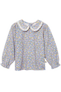 Floral blouse with a white collar on a white background