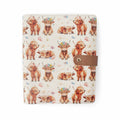 Maisy Highland Cow Project Journal Planner front cover with watercolor highland cow illustrations wearing flower crowns on a cream background with tan snap closure