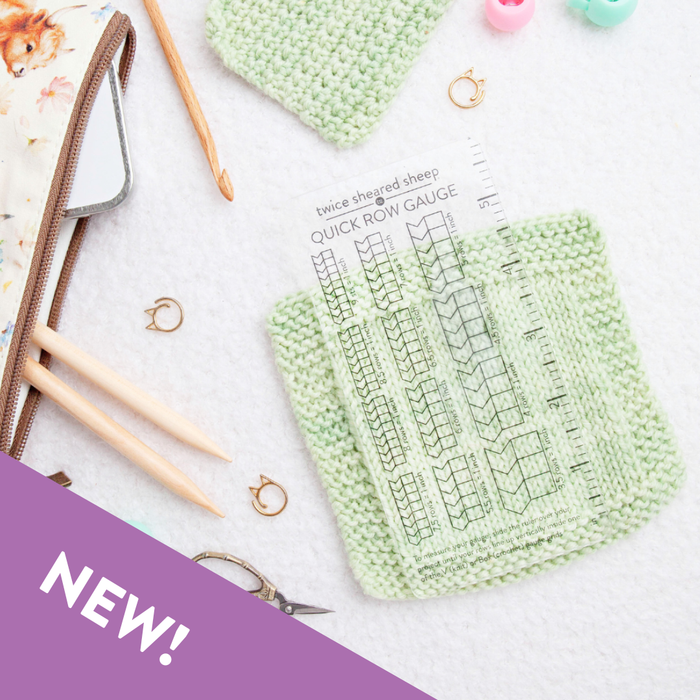 Quick ROW Gauge Ruler laid on a green knitted swatch showing how to measure row gauge, with Twice Sheared Sheep branding and NEW badge