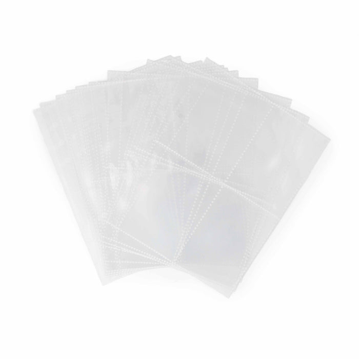 Set of twelve clear four-pocket card protector refill sleeves fanned out on a white background for the project journal binder