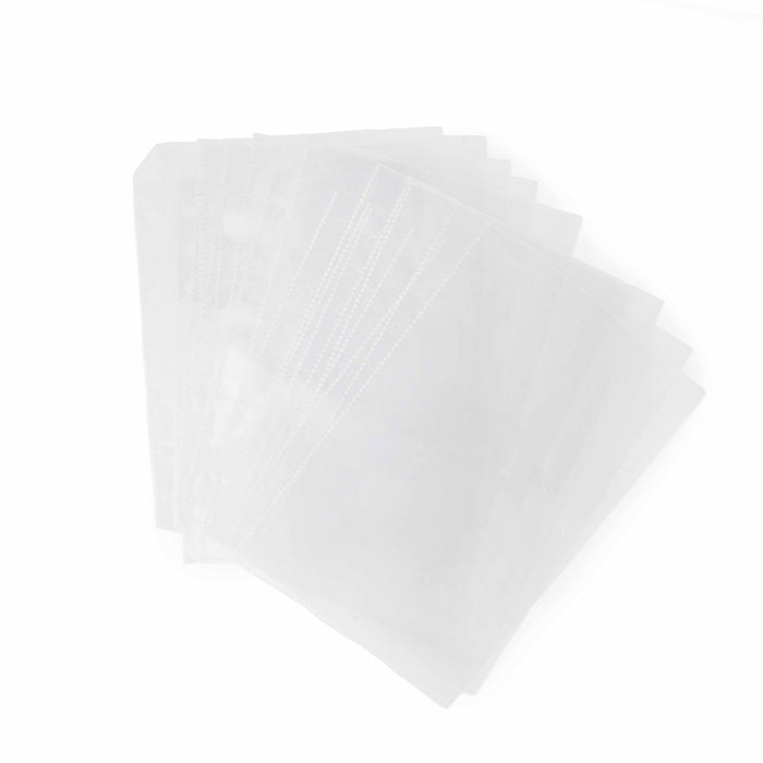 Set of twelve clear page protector refill sleeves fanned out on a white background for the project journal binder