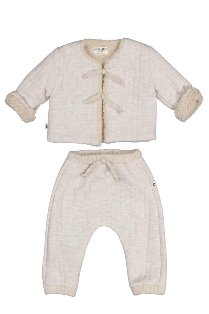 Baby outfit with jacket and pants on a white background