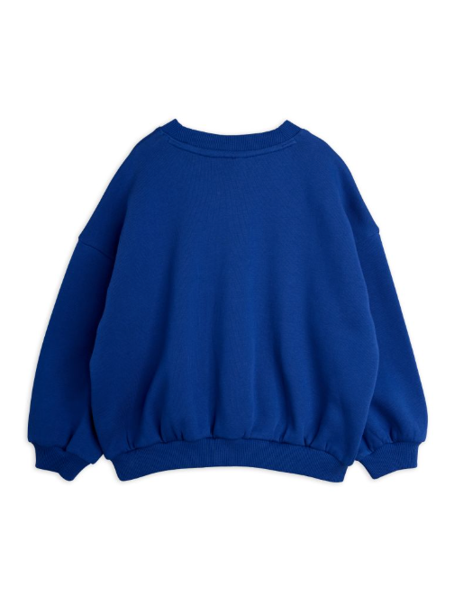 A royal blue crewneck sweatshirt shown from the back, featuring a relaxed fit with ribbed cuffs and hem, photographed on a solid white background.