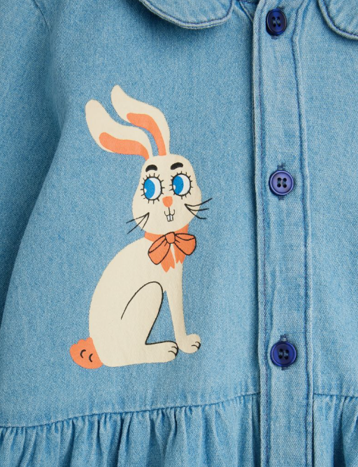 close up of bunny details in denim dress