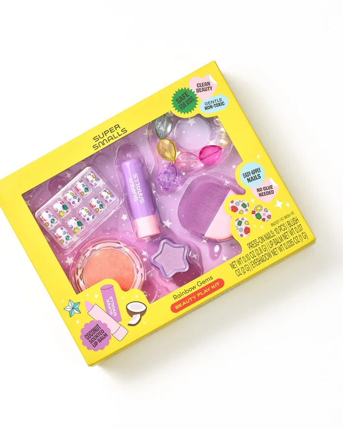 Toy makeup set in a yellow box on a white background