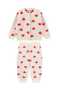 Children's outfit with heart patterns on a white background