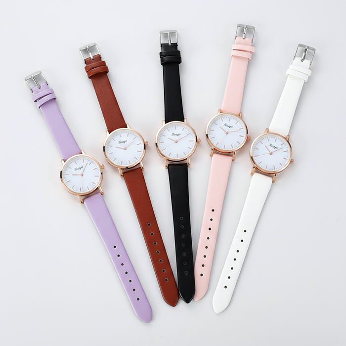 A sophisticated pair of all-black minimalist watches featuring a matte finish and a unique central numerical dial, paired with premium black leather straps for a refined "Art Gallery" editorial aesthetic.