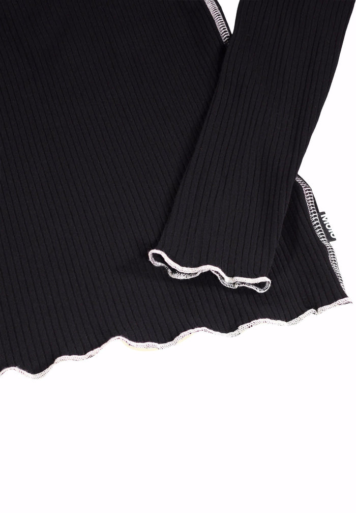 Black ribbed sweater with decorative trim on a white background
