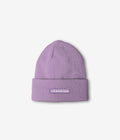 A lavender purple ribbed knit beanie hat with a folded cuff, featuring a small rectangular patch on the front with the word 'HEADSTER' in white text.