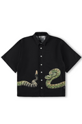 Black shirt with snake design on a white background