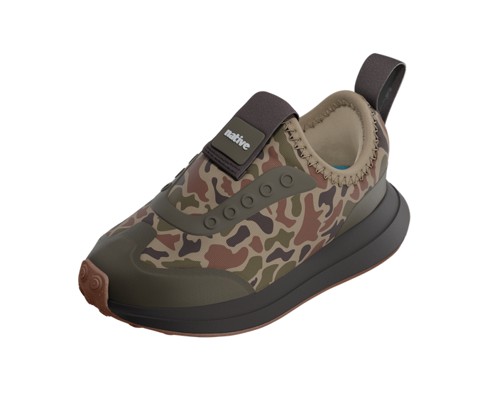 Camouflage-patterned shoe with a brown sole on a white background