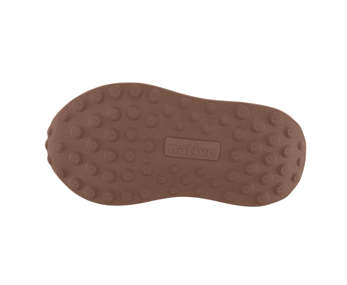 Brown shoe sole with 'Native' branding on a white background