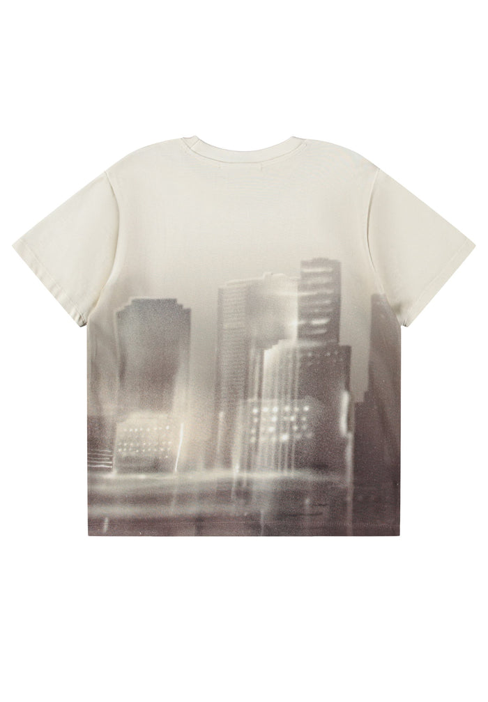 White t-shirt with cityscape print on a white background