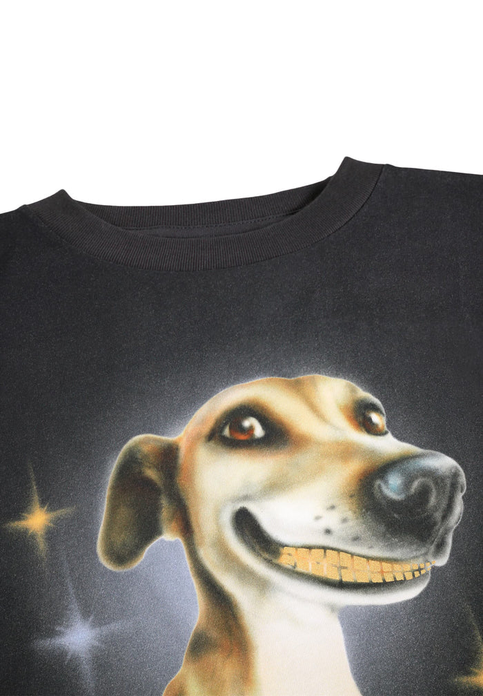 Black t-shirt with a graphic of a dog's face on a white background
