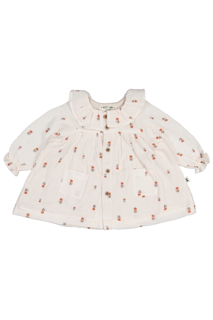 Baby dress with floral pattern on a white background