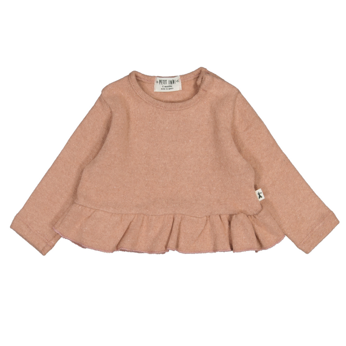 Pink sweater with ruffled hem on a white background