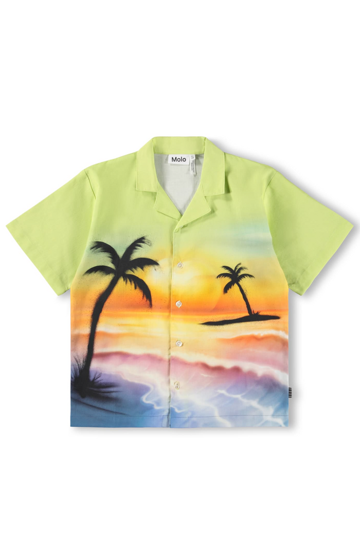 Shirt with a tropical design featuring palm trees and a sunset on a white background