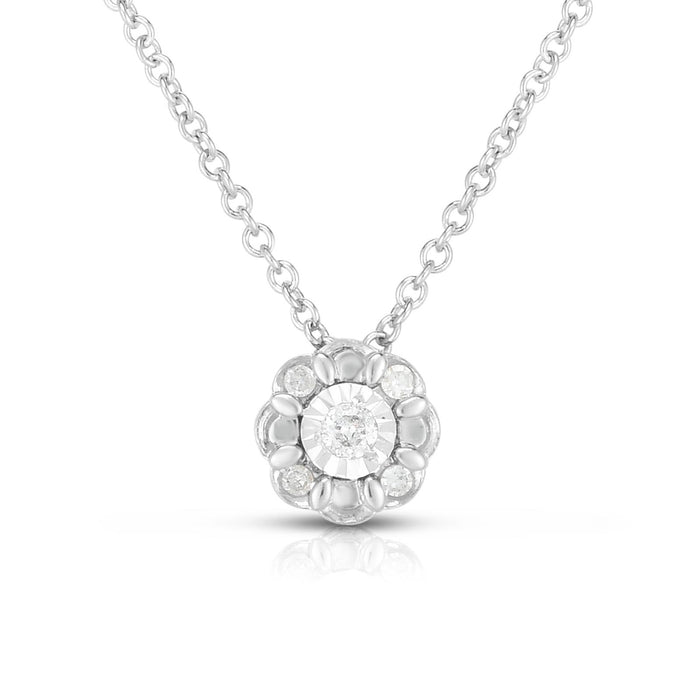 photo of delicate necklace, .10twt round diamonds set in sterling silver with diamond cutting and scalloped details for the extra radiance.