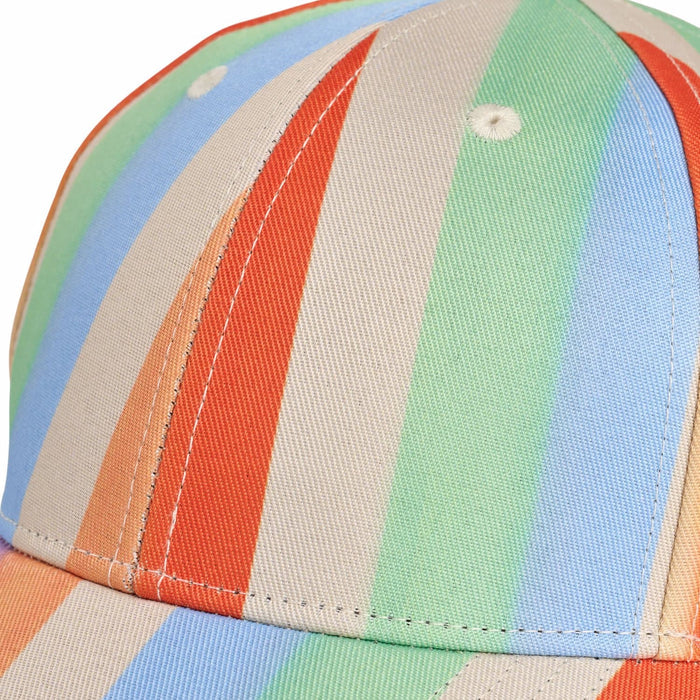 Close-up of a colorful striped cap with multiple colors including orange, green, blue, and beige.