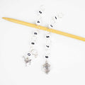 Two straight chain row counters on bamboo needle with silver llama charm for even numbers and silver sheep charm for odd numbers