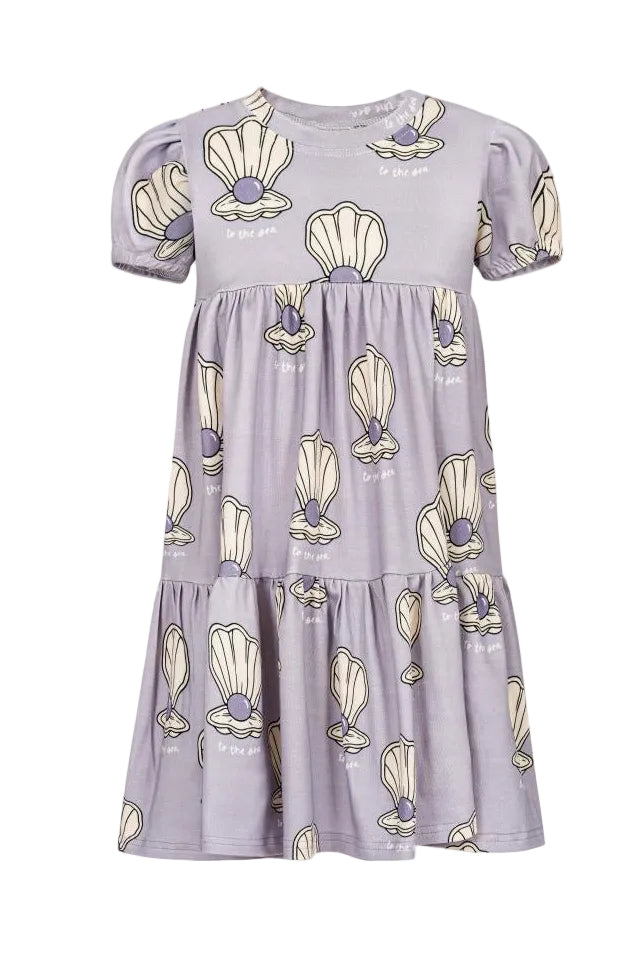 Purple dress with shell pattern on a white background