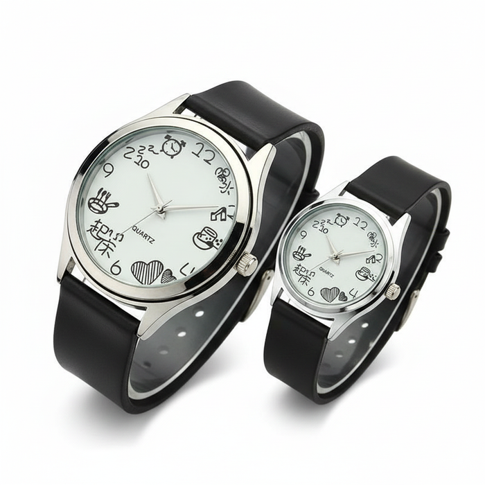 A charming pair of minimalist silver-toned watches featuring hand-drawn style illustrations on a clean white dial, paired with soft matte black straps for a creative and unique aesthetic.
