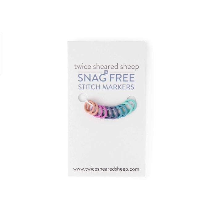 Twice Sheared Sheep Snag Free Stitch Markers on card in pastel rainbow colors including pink, purple, blue, and mint
