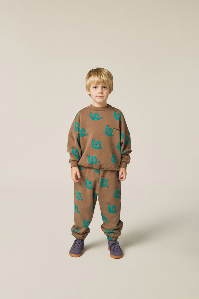 Child wearing snakes sweatshirt